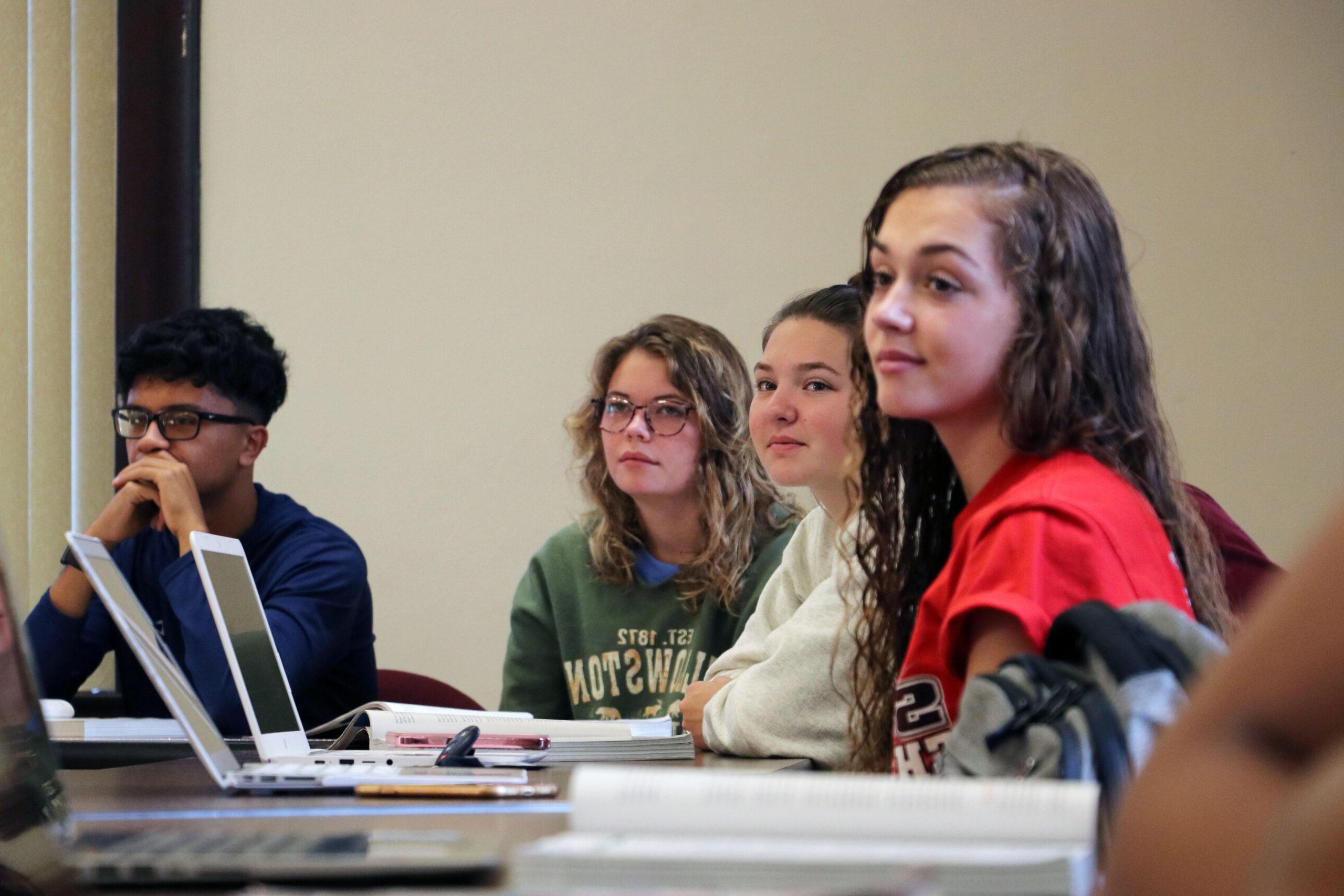 Students attentively listening to lecture